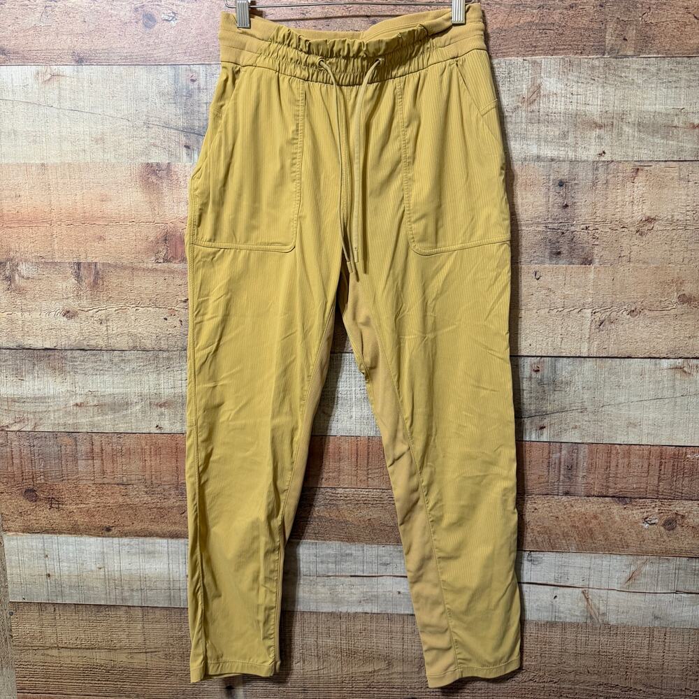 Lululemon Tan/ Gold Track Pants, Joggers Size 6